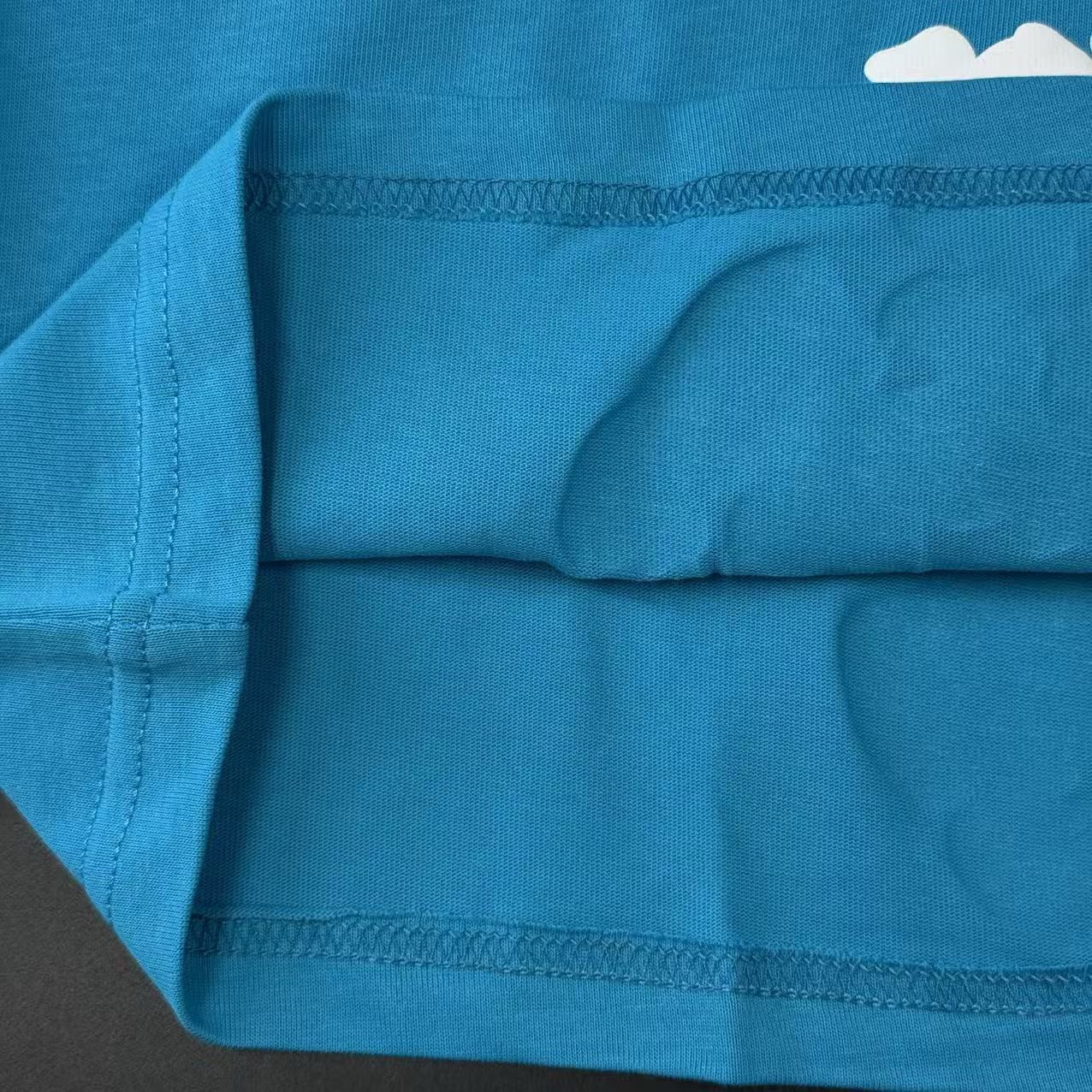 T-SHIRT DENIM TEARS