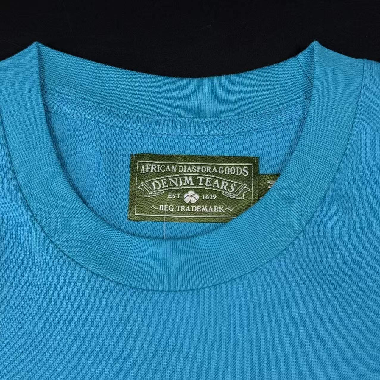 T-SHIRT DENIM TEARS